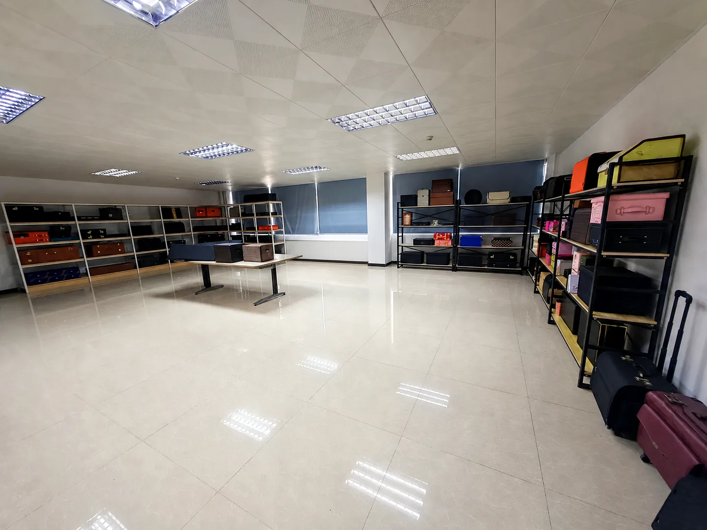 Product showroom with shelves of bags, cases and storage samples